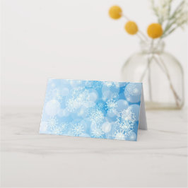 Cartão De Mesa Flocos de natal em um fundo azul
