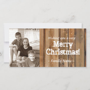 Cartão de Natal de madeira da foto das pranchas do