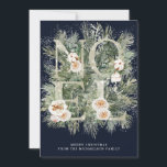 Cartão de Natal para Neve Botânica Noel Winter Pin<br><div class="desc">Noel é soletrado em letras cintilantes prateadas embelezadas com flores brancas. Eles estão aninhados em galhos de pínus de inverno que estão apimentados com neve. Duas linhas de texto branco estão abaixo e permitem personalizar sua mensagem. O fundo azul escuro os torna realmente pop.</div>