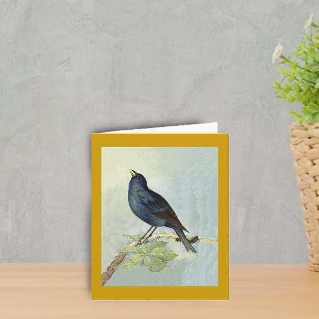 Cartão de nota da aguarela do melro do canto (Elegant singing blackbird on branch with caterpillar leaves on dark golden yellow boder notcard.)