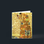 Cartão de Nota de Cumprimento Gustav Klimt<br><div class="desc">Cartão de nota de preenchimento Gustav Klimt. Frieze de 1909. Completado durante a fase de ouro do Klimt, o Fulfillment apresenta um casal abrangente que se segura sob uma colcha multipadrão, com espirais, olhos, aves, peixes e outras formas. O fundo da obra apresenta as mesmas espirais de bronze que adorariam...</div>