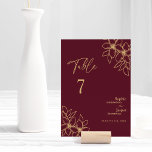 Cartão de Número de Tabela Floral Dourada Burgundy<br><div class="desc">Este cartão de números florais de mesas de casamento florais de ouro burguês apresenta um belo e sofisticado pano de fundo de merlot escuro com elegante caligrafia de ouro e embelezamentos florais dourados. A história da cor da joia e os sotaques botânicos do ouro, juntamente com uma guião minimamente delicada,...</div>