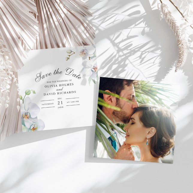 Cartão de Salvar a Data de Casamento com Foto de O (White Orchid Photo Wedding Save the Date Card on a sunny white table with white dry flowers.)