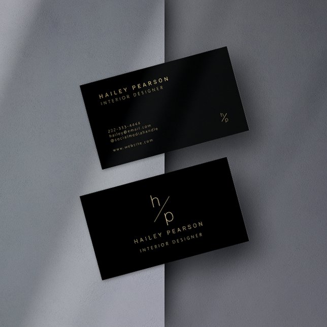 Cartão De Visita Monograma do eterno: Elegância moderna em preto e  (A chic black and gold business card with an elegant monogram design.)
