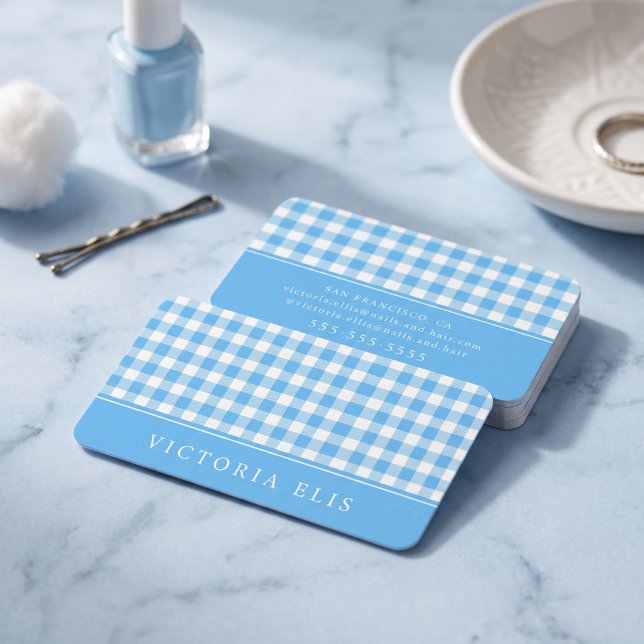 Cartão De Visita Xadrez Azul Clássico (Simulated business cards on table)
