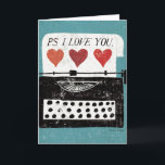 Cartão Desktop Vintage - Máquina de escrever<br><div class="desc">© Michael Mullan / Wild Apple. Uma velha máquina de escrever preto e branco com fundo azul. As palavras PS I Love You pode ser vista na imagem.</div>