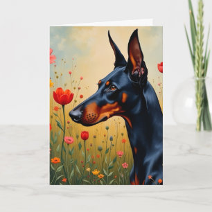 Cartão Doberman num campo de flores