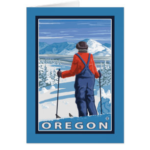 Cartão Esquiador que admira o poster das viagens vintage