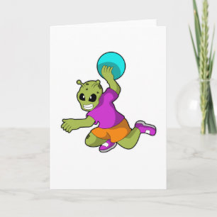 Cartão Extraterrestre na mão do jogador de handebol