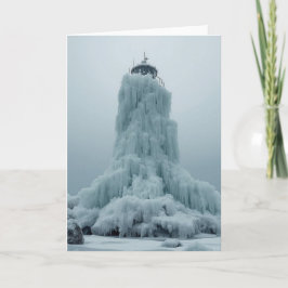 Cartão farol costeiro no inverno