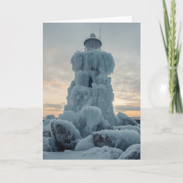 Cartão farol costeiro no inverno