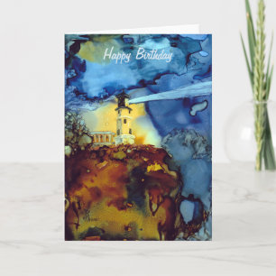 Cartão Farol rachado da rocha na noite