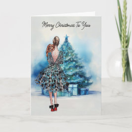 Cartão Feliz Natal, mulher e árvore de Natal azul