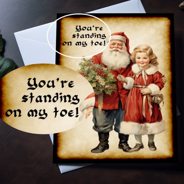 Cartão Feliz Natal para Papais noeis (A Victorian Christmas card with humorous picture on the front is lying on top of a desk.)