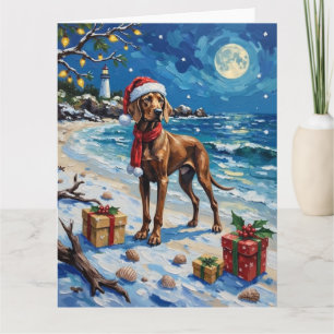 Cartão Férias de Natal na Praia com Weimaraner
