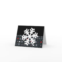 Flocos de neve de Natal e folhas com fundo preto