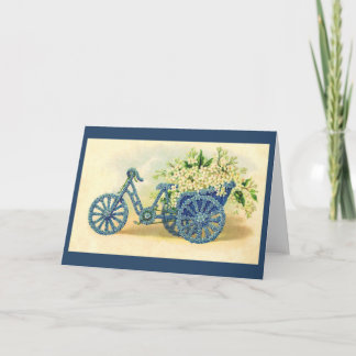 Cartão floral azul do triciclo do vintage