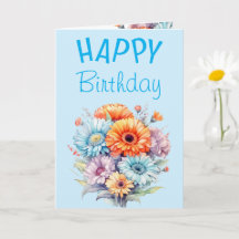 Flores de gerbera feliz aniversário em branco azul