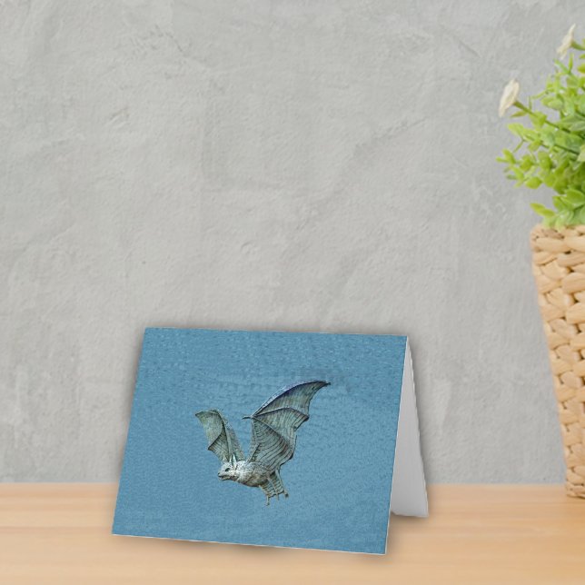 Cartão Flying 3D Blue Bat (Spooky flying blue bat white face on blue notecards.)