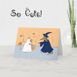 Cartão Fofo de Halloween com Cães Fazendo Travessu