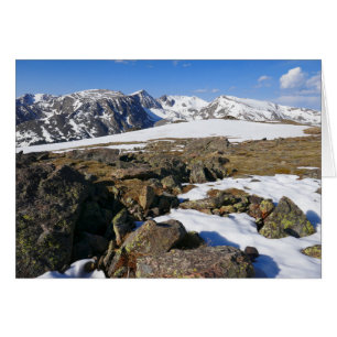 Cartão Fusão de neve nas montanhas rochosas