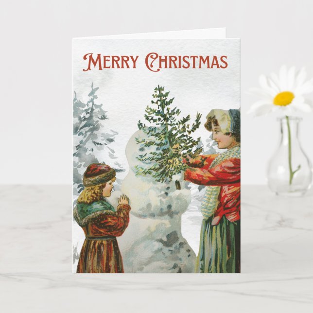 Cartão Garotas vitorianas construindo um boneco de neve (Planta pequena)