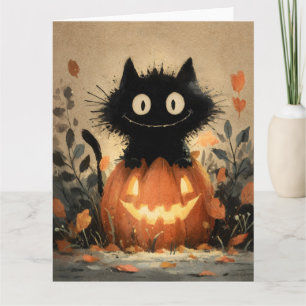 Cartão Gato Negra Bonito do Halloween em um Jack-o-Lanter