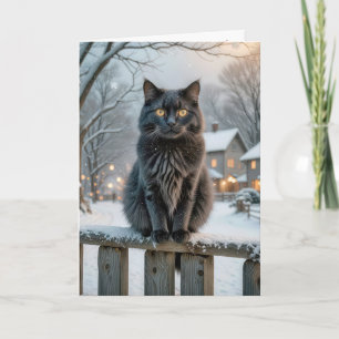 Cartão Gato Negro de Natal em uma cerca de neve