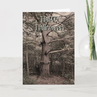 Cartão Girl behind tree halloween card
