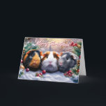 Cartão Guiné Pigs Winter Wonderland Christmas<br><div class="desc">Espalhe alegria de férias com este maravilhoso cartão de Natal com 3 adoráveis cobaias! Marcada numa festiva cena de inverno com galhos de pínus nevados, bagos vermelhos e cones de pínus, este cartão de Natal da cobaia captura a magia da estação, com uma mensagem de "Feliz Natal". A atmosfera acolhedora...</div>