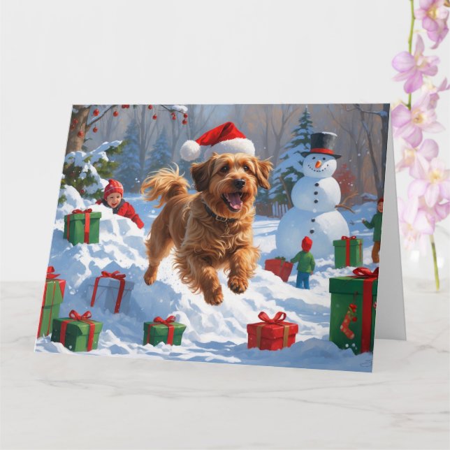Cartão Havanese Correndo na Neve com Chapéu de Natal (Orquídea)