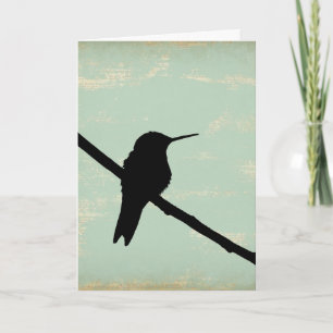 Cartão Hummingbird Silhouette on Blue Grunge Background