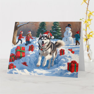 Cartão Husky Siberiano Correndo na Neve com Chapéu de Nat