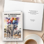 Cartão Idade é Elefantes Irrelefantes Engraçado Aniversár<br><div class="desc">Cartão de aniversário engraçado, escrito com elefante, com o tema "A idade é irrelefante". Você pode personalizar a frente da placa e o dentro de mensagem. Design apresenta a ilustração aquosa dos elefantes na savana com balões coloridos de aniversário a derivar para o céu. Cartão divertido com humor leve e...</div>