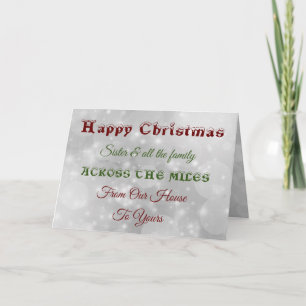 Cartão Irmã de Natal e toda a família ao longo dos quilôm