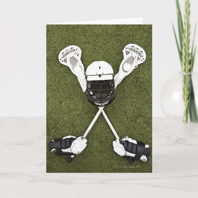 Cartão Lacrosse sticks, gloves, balls and sports helmet (Frente)