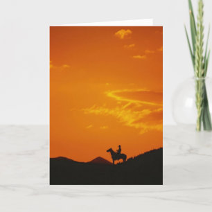 Cartão Laranja Sunset com Silhouette Cowboy