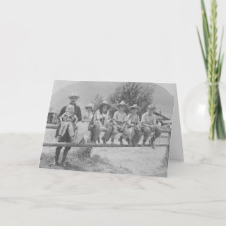 Cartão Larry Larom with six children on a fence.