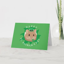 Lindo hamster do Dia de São Patrício espiando pelo