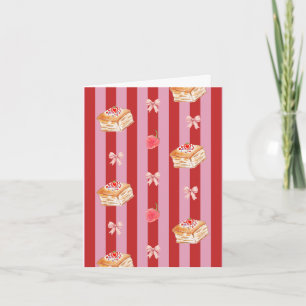 Cartão listrado rosa e vermelho com padrão de bolo