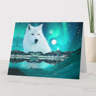Cartão Lobo ártico e noite mágica com luzes do norte