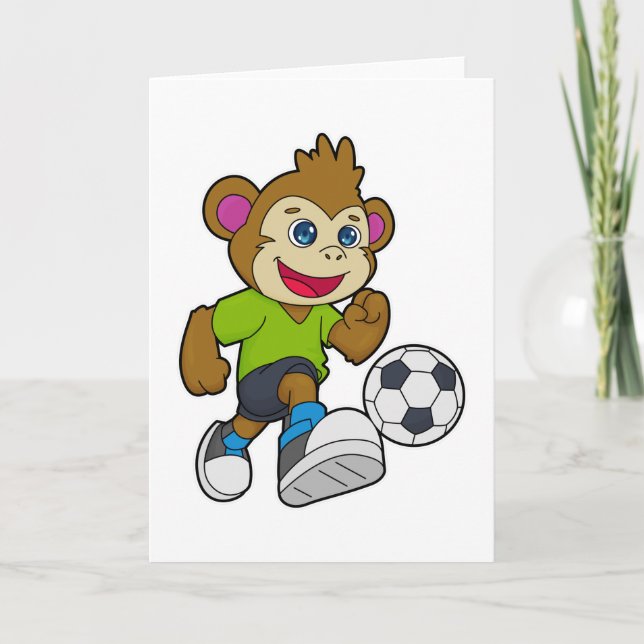 Cartão Macaco como jogador de futebol com bola de futebol (Frente)