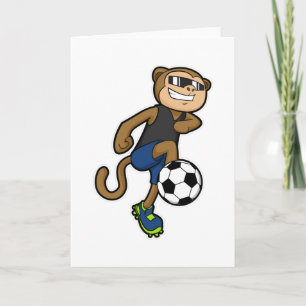 Cartão Macaco como jogador de futebol no futebol