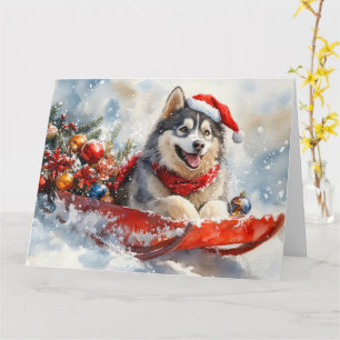 Cartão Malamute do Alasca em Trenó Deixe Nevar Natal