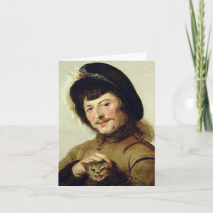 Cartão Man Tugging Kitten's Ear de Judith Jans Leyster