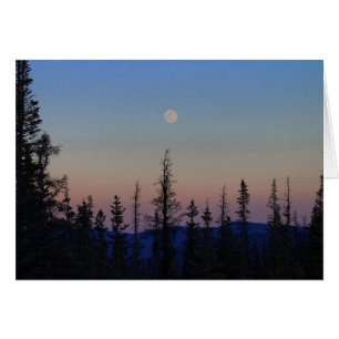 Cartão Moonrise sobre as Rochosas
