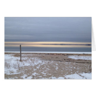 Cartão nascer do sol do inverno sobre a baía