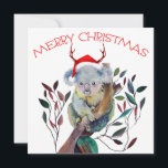Cartão Natal australiano Koala Santa Hat Red Green<br><div class="desc">"Feliz Natal". A mão desenhou coala de Natal colorida vestindo um chapéu de Papai Noel e sentando em uma goma de gude. O Koala é nativo da Austrália.</div>
