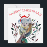 Cartão Natal australiano Koala Santa Hat Red Green<br><div class="desc">"Feliz Natal". A mão desenhou coala de Natal colorida vestindo um chapéu de Papai Noel e sentando em uma goma de gude. O Koala é nativo da Austrália.</div>