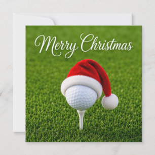 Cartão Natal de golfe com chapéu de Papai Noel na grama v
